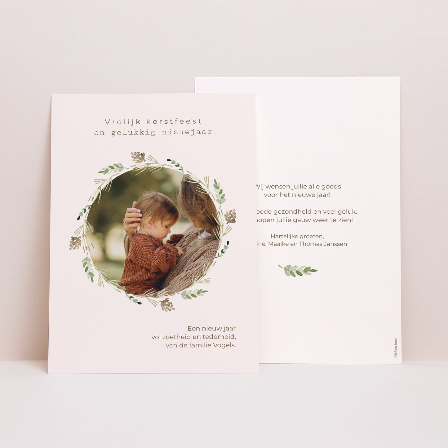 Kerstkaart Eindejaar Dennenappelkrans foto N° 1