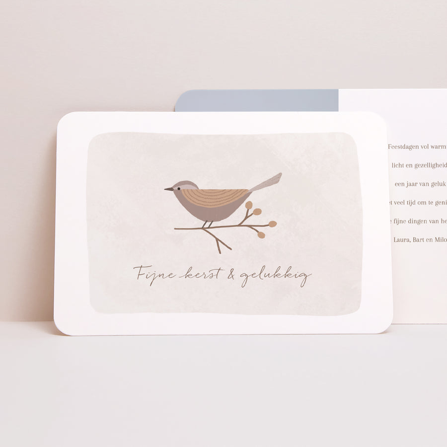 Kerstkaart Eindejaar Landschap, afgeronde randen De geluksvogel foto